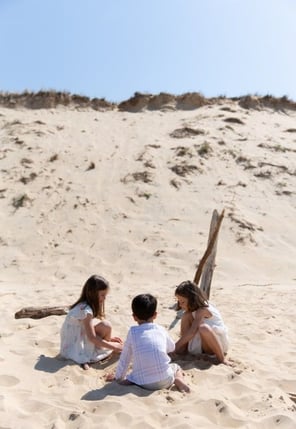 kids playing on the beach