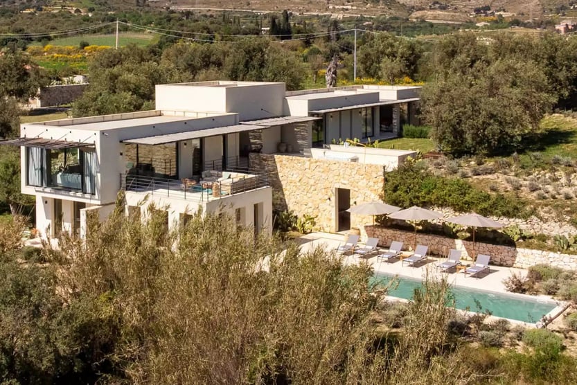 exterior of villa avolesi with terrace and pool