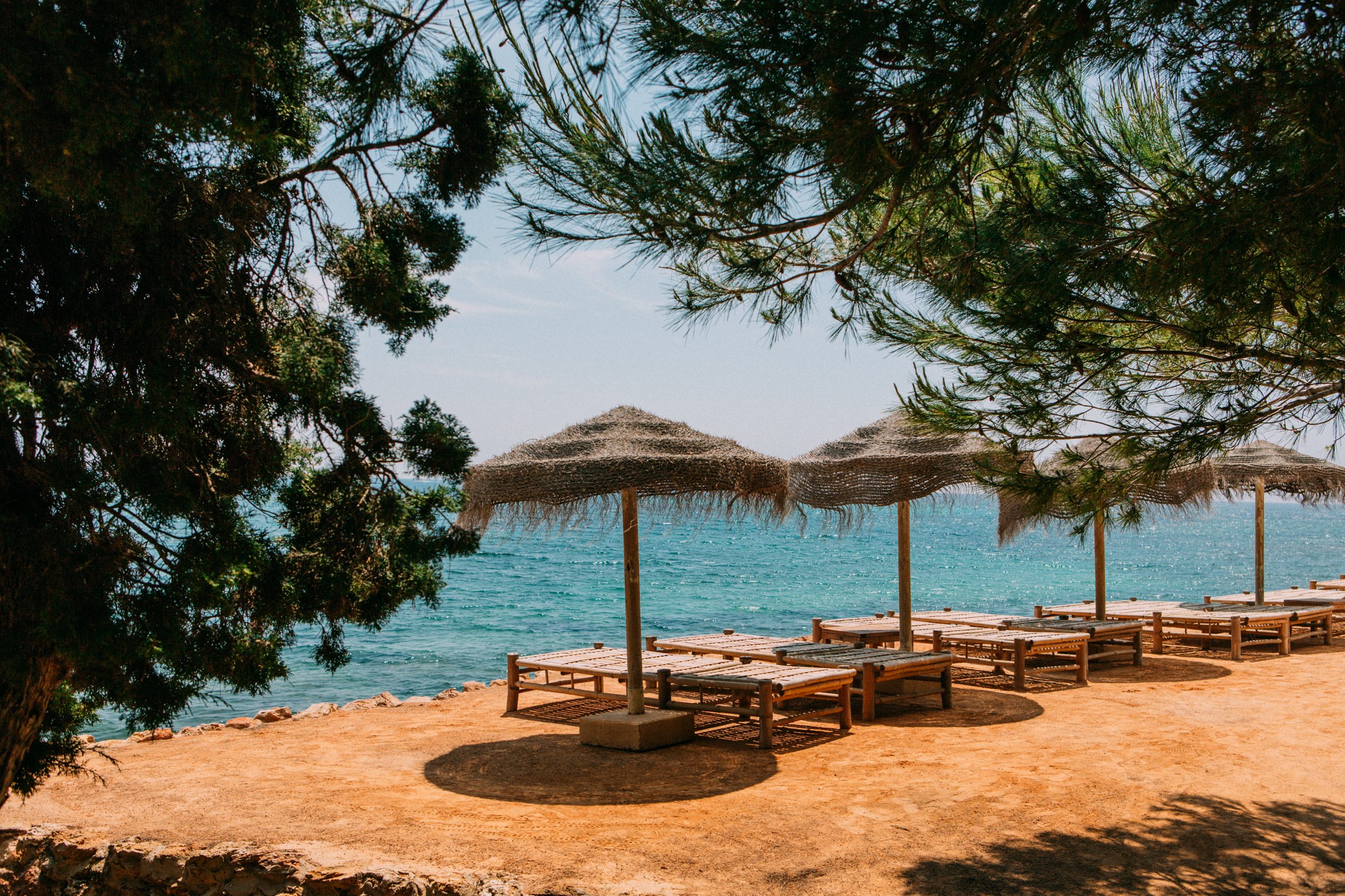 Sun loungers at a beach club in Ibiza