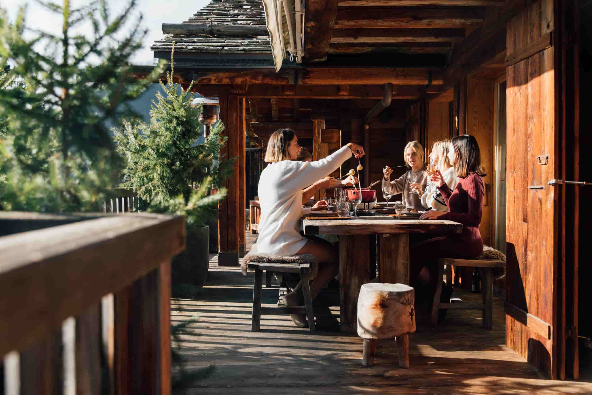 Verbier-ski-in-ski-out-fondue-and-trees-min