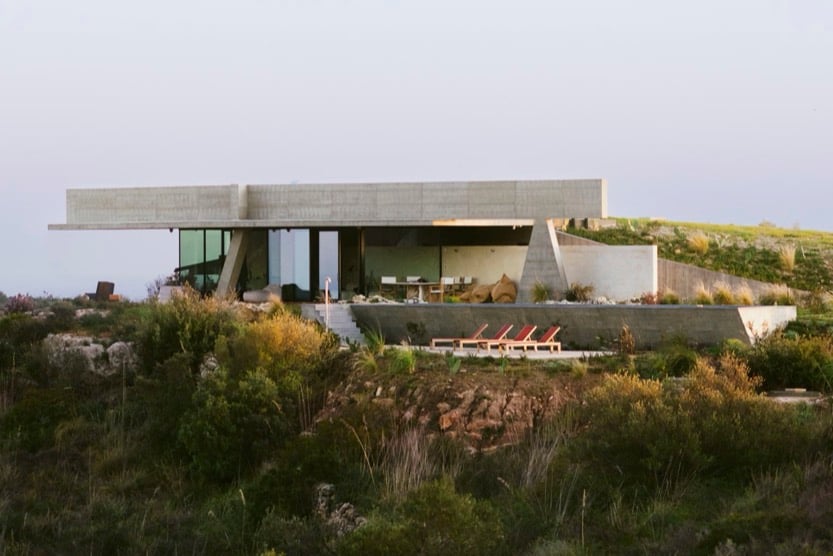 view from a distance of the exterior of Villa Primordiale