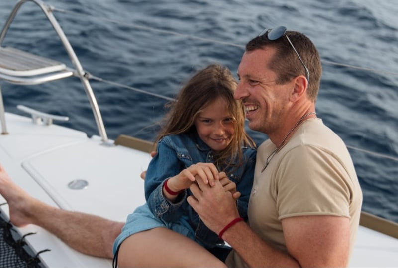 south-france-best-cities-boat-father-daughter-smiles-holding-hands