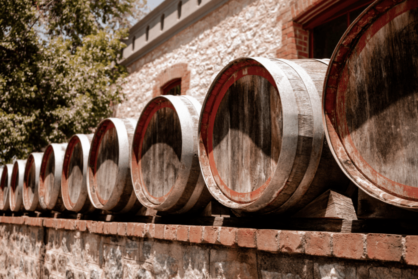 the-best-vineyards-in-tuscany-barrels-min