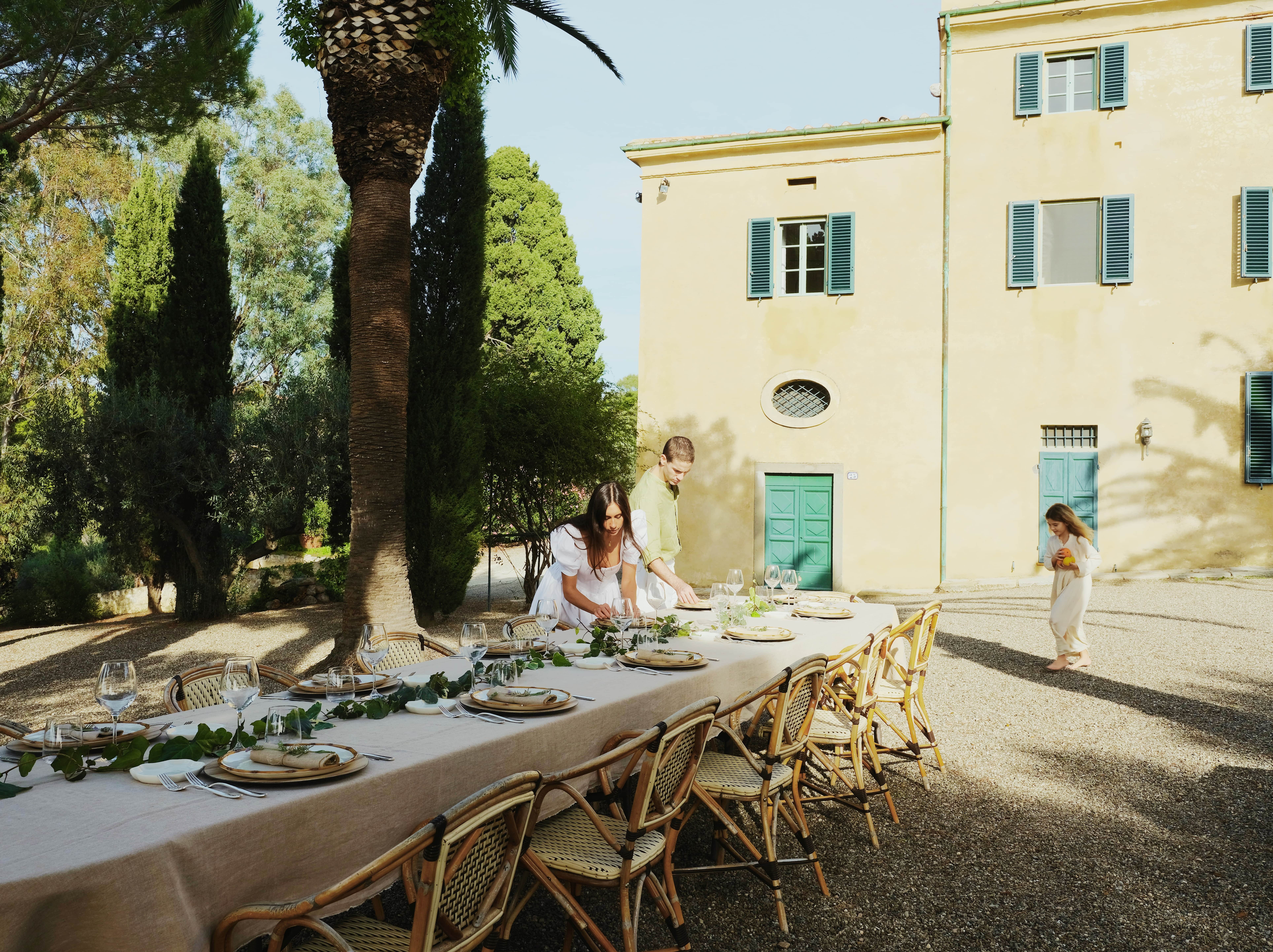 family setting the table