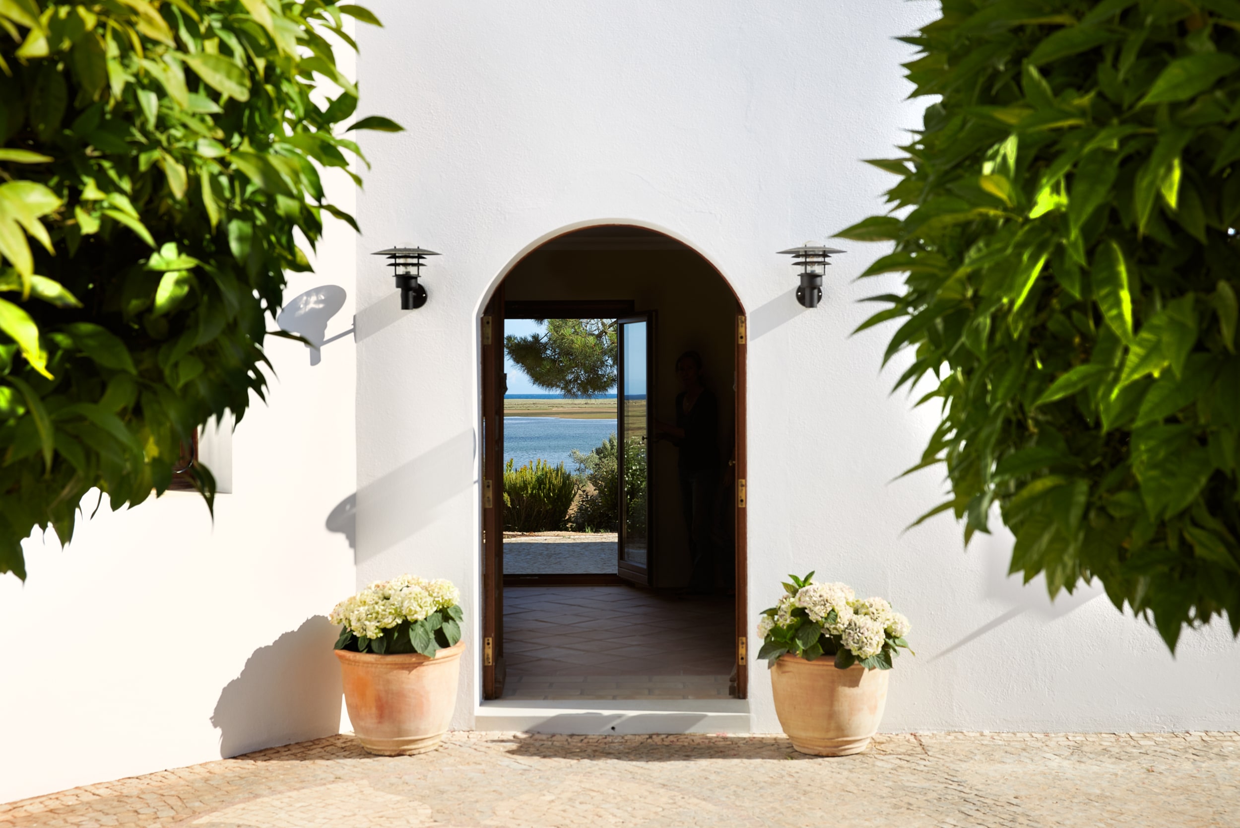 villa-luz-archway-plants-min