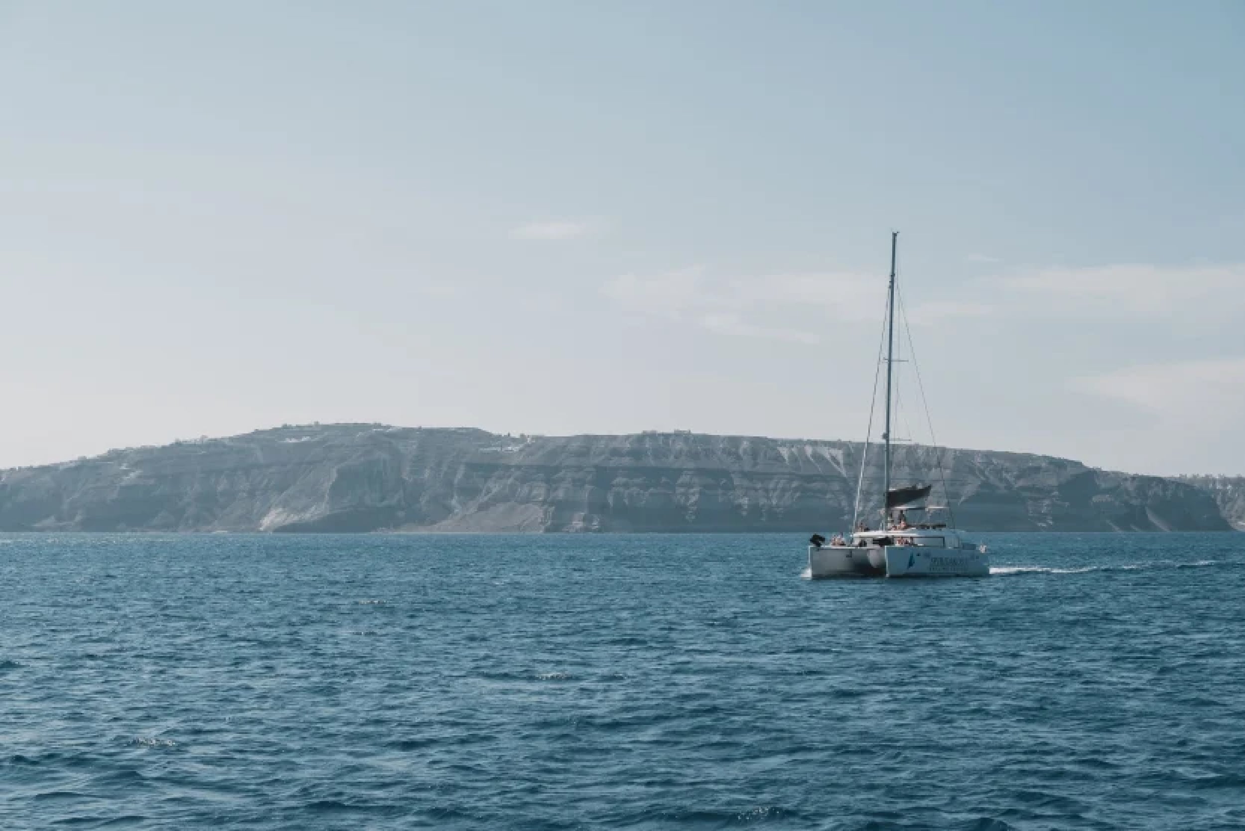 visit-the-island-of-delos-cyclades-catamaran-open-sea-min